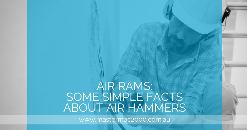 worker uses air hammer chisel