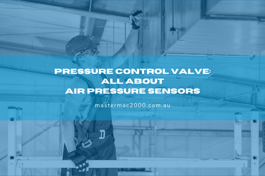 man checking commercial HVAC system